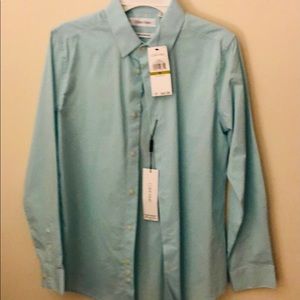 NWT Boys dress shirt Calvin Klein light Blue /Teal color